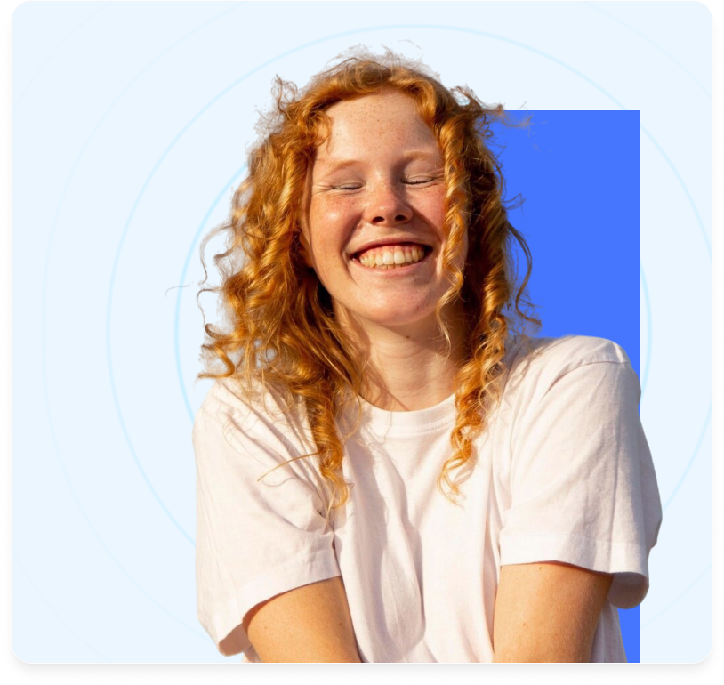A woman laughing with her eyes closed, framed by the concentric rings and blue block of the Aris brand